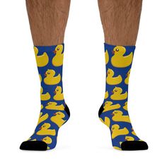 Introducing the Ducky Tie Socks - the perfect blend of playful nostalgia and dapper style inspired by the legendary sitcom. These socks pay homage to one of the most iconic accessories in the show: Barney's legendary ducky tie. These socks feature an eye-catching design that replicates the charm of Barney's renowned ducky tie. Vibrant yellow ducks are playfully scattered against a sleek navy blue background, capturing the whimsical spirit of the show. Whether you're a die-hard HIMYM fan or simply appreciate quirky and stylish accessories, these socks are bound to spark conversations and bring smiles wherever you go. Gift a pair of Ducky Tie Socks to a fellow HIMYM enthusiast, or treat yourself to a playful reminder of the iconic show. They make an ideal present for birthdays, holidays, or Iconic Accessories, Christmas Stocking Gifts, Socks Christmas, Dapper Style, Yellow Duck, Navy Blue Background, Funny Socks, Die Hard, Socks And Hosiery