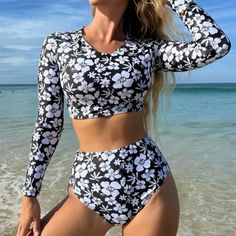 Floral Print Bikini Lace Up Back High Waisted Bottoms Color Is Black And White Hand Wash Only 82% Polyester & 18% Elastane Size Medium Bottom Length 13.8 Inch Waist 26-39.4 Inch Hips 31.1 Inch Top: Shoulder 14.6 Inch Sleeve Length 22 Inch Top Length 13.8/4.9 Inch Bust 33.1 Inch Black Swimwear For Spring Surfing, Fitted Black Swimwear For Beach Party, Black Swimwear For Surfing In Spring, Black Surfing Swimwear For Spring, Fitted High Waist Swimwear For Beach Party, Fitted High Waist Printed Swimwear, White Swimwear For Surfing In Spring, White High Waist Tankini For Swimming, High Waist White Tankini For Swimming