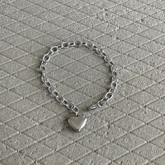 We love stainless steel jewelry! It can look sleek, punky and also lend itself to a hippyish aesthetic. ▪️▪️▪️PRODUCT Women Solid Heart Charm Cable Chain Bracelet Size 19cm Length (adjustable) 316L surgical stainless steel  Never Fade and Hypoallergenic Care instructions: avoid contact with liquids (water, perfume, beauty products) wipe dry with a soft cloth. VISIT STORE FOR MORE PRODUCT 🔗 https://www.etsy.com/ca/shop/TWISTEEL ▪️▪️▪️ S H I P P I N G   All orders will be shipped on the next business day UNITED STATES  - USPS First-Class Mail * 4 - 14 Business Days  Tracking & Insurance included CANADA - Canada Post * 4 - 14 Business Days Tracking & Insurance included EUROPE * 6 - 14 Business Days Tracking & Insurance included AUSTRALIA & ASIA  * 6 - 21 Business Days Tracking & Insurance in Metal Heart Bracelet For Everyday, Trendy Metal Heart Bracelet For Valentine's Day, Trendy Metal Heart Bracelet For Everyday, Trendy Metal Heart Charm Bracelet, Trendy Silver Bracelets With Heart Charm, Trendy Silver Heart Bracelet For Friendship, Everyday Silver Metal Heart Bracelet, Trendy Metal Charm Bracelet With Heart Charm, Trendy Metal Bracelets With Heart Charm