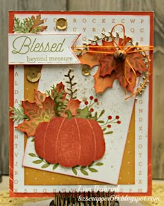 a close up of a card with a pumpkin