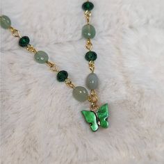 Green Aventurine And Glass Crystal Beaded Gold Choker Necklace With Green Butterfly Charm Measures Approximately 14" And Is Finished With A Gold Toned Stainless Steel Chain With A Lobster Clasp And 1.5" Extension Chain. Green Butterfly, Gold Choker Necklace, Gold Choker, Butterfly Charm, Accessories Jewelry Necklace, Necklace Choker, Handmade Gold, Green Aventurine, Glass Crystal