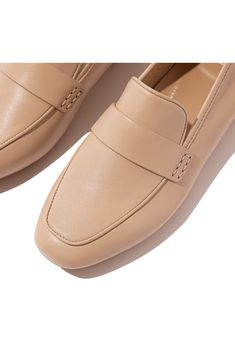 A squared-off moc toe and rich leather upper add sophisticated elements to a luxe loafer set on a cushioned footbed and slip-resistant rubber sole. Cushioned footbed with arch support Leather upper/textile lining/rubber sole Slip-resistant sole Imported American Podiatric Medical Association (APMA) Seal of Acceptance Classic Slip-on Flats With Square Toe, Classic Beige Slip-ons For Office, Cushioned Slip-on Loafers For Office, Classic Slip-ons With Square Toe And Rubber Sole, Office Loafers With Cushioned Footbed, Office Slip-on Loafers With Cushioned Footbed, Classic Beige Slip-ons With Cushioned Footbed, Business Casual Loafers With Cushioned Footbed And Almond Toe, Classic Synthetic Moccasins For Formal Occasions