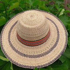 *Straw hats are popular for every good reason and use. Serving as a hat gift, summer beach hats, fashion hats, festive hats, sun hats and a hat for gardening. They come in several editions; kids' hats, women's hats, men's hats and unisex hats. The widebrim style of it protects against direct sun rays making it ideal hay for summer beach expeditions. It's also suitable for use as a retro party hat, or festive hat.  *kindly note as much as we try to produce exactly the hat you chose, no two handmade would be exactly the same. The beauty definitely exists in the  supposed small imperfections. *Please contact us for bulk purchases and customized orders. Handwoven Flat Brim Straw Hat For Vacation, Handwoven Hat Bands For Summer Beach, Wide Brim Summer Hat In Palm Leaf, Adjustable Handwoven Wide Brim Straw Hat, Summer Boater Hat With Handwoven Flat Brim, Handwoven Boater Hat With Curved Brim For Vacation, Handwoven Summer Hat Bands For Vacation, Natural Woven Wide Brim Boater Hat, Natural Wide Brim Woven Boater Hat