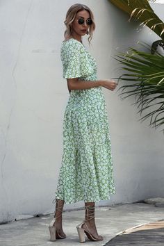 Breezy V-neck Maxi Dress For Brunch, Breezy V-neck Maxi Dress For Vacation, Breezy V-neck Maxi Dress For Beach Season, Beachy V-neck Maxi Dress For Day Out, Breezy V-neck Beach Cover-up Dress, Floral Print V-neck Dress For Beach Party, Summer V-neck Beach Dress For Day Out, Beachy V-neck Sundress For Beach, Beachy V-neck Sundress For The Beach