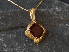 Gold Ruby Pendant set with a Created Ruby in a top quality, perfect clarity & stunning red color, at 12x12mm, weighting 7 Carats. Vintage Pendant design made of Gold Vermeil ☞ thickest 18k Gold Plating on top of Solid 925 Sterling Silver ☞ made to last. Free Vermeil Chain with every Pendant order, 18 inch Silver chain (46 cm) ✓ Matching Ring & Matching Earrings - please ask me ⌛Last Pendant left ⌛ Details : ♥ Each item comes in a cute GIFT BOX ✓ ♥ GUARANTEE on the materials ✓ ♥ Created Ruby in a Gold Antique Pendant, Ruby Necklace Gold, Ruby Pendant Set, Ring Matching, Ruby Pendant, Antique Pendant, Matching Ring, Ruby Necklace, Square Pendant