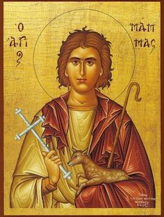 an icon of jesus holding a lamb with two crosses in his left hand and the words,