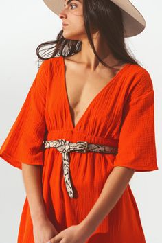 Introducing our Textured V-Neck Maxi Dress in Orange, the perfect summer dress for those warm sunny days! Made with 100% cotton, this dress is lightweight and breathable, making it comfortable to wear all day long. The relaxed fit of this dress is both comfortable and stylish, making it the perfect choice for a day out with friends or a casual date night. This dress features a v-neck neckline and angel sleeves, adding a touch of boho-chic to your wardrobe. The dress is designed with an open back Orange Maxi Dress, Angel Sleeves, Casual Date Night, Angel Sleeve, Boho Style Dresses, Estilo Chic, Casual Date, Estilo Boho, Inspired Dress