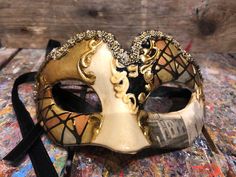 "Original Venetian Colombina mask for children very resistant, hand painted embellished with gold leaf, decoration with stucco and acrylic colors. -Material/Resin Made in Italy hypoallergenic and non-toxic. -Dimensions/13x6 Unisex -History of the mask/ \"Colombina\" is an ancient mask dating back to the 15th century. She represents a cunning and lying servant at the court of often very rich men such as the greedy and rich Venetian merchant \"Pantalone\" of Carlo Goldoni's commedia dell'arte. -Sh Artistic Masks And Prosthetics For Mardi Gras Carnival, Venetian Masks For Mardi Gras Carnival, Multicolor Masks And Prosthetics For Carnival Masquerade, Multicolor Masks And Prosthetics For Masquerade And Carnival, Venetian Masks For Mardi Gras, Multicolor Masks For Masquerade Carnival, Venetian Masks For Mardi Gras Gift, Artistic Multicolor Masquerade Mask For Carnival, Artistic Mardi Gras Costume Masks And Prosthetics