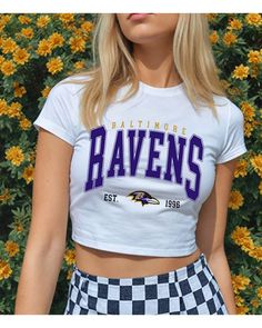 Get ready to cheer on the Baltimore Ravens in style! This shirt is perfect for game days, casual outings, or any day you want to support your favorite team.  Made from soft, high-quality material, it offers comfort and durability. Show your Ravens spirit with flair! Shirt is a cropped, fitted baby tee Nfl Ravens, Gameday Fits, Football Party Ideas, Baltimore Ravens Football, Gameday Outfits, Ravens Football, Football Baby, Football T Shirt, Football Party