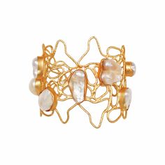 Make a bold statement with our unique Baroque Pearl Cuff Bracelet. Expertly made with a keen eye for design, this bracelet is perfect for the woman who loves unique and bold jewelry. Hand made by artisans in India from 22k gold plated brass and featuring natural baroque pearls, this cuff bracelet is a true masterpiece. With an intricate design, this bracelet is both visually striking and contemporary, making it the perfect choice for the woman who loves to make a statement. The baroque pearls ar Unique Gold Cuff Bracelet, Handmade Fusion Style Yellow Gold Bracelets, Handmade Pearl Bangle Bracelet For Formal Occasions, Handmade Yellow Gold Fusion Bracelets, Handmade Luxury Gold Bangle Bracelet, Luxury Handmade Gold Bangle Bracelet, Artisan Gold Cuff Bracelet For Gift, Gold Fusion Style Cuff Bracelet As Gift, Handmade Gold Pearl Bracelet For Party