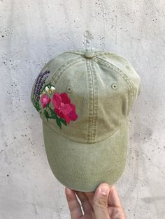 Hand embroidered women hat with floral design / baseball hat for women Color: khaki baseball cap. Design: hand-embroidered pion with wildflowers. Cap size (head circumference): 55 - 67 cm. The quality of the embroidery and baseball cap is superior, I guarantee! ;) I really enjoyed making this, and I hope my customer will enjoy showing it off. 🌿PLEASE NOTE I NEED 2 WEEKS TO EMBROIDER THIS HAT FOR YOU🌿 CHECK OUR OTHER ACCESSORIES 🌸 More Baseball hats: https://www.etsy.com/shop/KazkovaEmbroidery Vintage Dad Hat With Curved Bill For Spring, Embroidered Short Brim Baseball Cap, Green Curved Brim Dad Hat For Spring, Green Cotton Trucker Hat For Spring, Spring Baseball Cap With Embroidered Logo, Spring Green Cotton Trucker Hat, Spring Baseball Cap With Embroidered Logo And Short Brim, Green Curved Bill Hat For Spring, Casual Summer Hats With Custom Embroidery