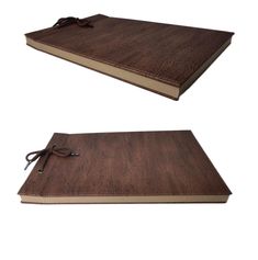 two brown notebooks sitting side by side on top of each other, one is open and the other closed