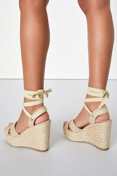 Pair your new maxi dress with the Lulus Esme Natural Lace-Up Espadrille Wedges! Beige canvas straps cross over an almond toe bed, while an ankle strap (with silver grommets) supports wide laces that wrap and tie around the ankle. 4. 75" espadrille-wrapped wedge. Cushioned insole. Nonskid rubber sole. All vegan friendly, man made materials. Imported. Lulus | Esme Natural Lace-Up Espadrille Wedges. Summer Vacation Cross Strap Wedge Sandals, Cross Strap Wedge Sandals For Summer Beach, Cross Strap Wedge Sandals For Beach In Summer, Summer Cross Strap Wedge Sandals For Beach, Beige Fabric Wedge Sandals For Summer, Summer Cross Strap Wedge Sandals With Wrapped Heel, Summer Wedge Sandals With Wrapped Heel And Cross Strap, Summer Ankle Wrap Sandals With Straps, Adjustable Cream Wedge Sandals For Spring