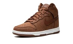 The Women’s Nike Dunk High Premium “Pecan” is a women’s-exclusive colorway of the popular sneaker with a mostly brown design.  A versatile, casual look for the Dunk High, the “Pecan” colorway features a monochromatic burnt orange upper with tonal overlays and Swoosh branding.  A debossed “Nike” logo is found on the tongue along with a classic Swoosh emblem.  Underfoot, a white rubber midsole and Pecan-colored rubber outsole finish off the look.  Release date: October 12, 2022 Brown Nike Shoes, Nike Dunk High Premium, Nike Air Force 1 High, Air Force 1 High, Brown Design, Shoe Wishlist, Popular Sneakers, Nike Dunk High, Dunk High