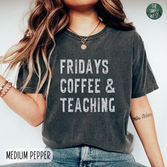 ORDERS PLACED AFTER 12/11 ARE NOT GUARANTEED TO ARRIVE BY CHRISTMAS. No refunds will be issued for orders placed after the 10th that don't make it in time. This Teacher Comfort Colors shirt will add a special and personal touch to your wardrobe! This crewneck tee is the perfect gift for teachers that love Fridays, coffee, and teaching. IMPORTANT INFORMATION - All Sales Are Final: refunds, returns, or exchanges are not available since each item is made to order. - Processing Time: 1-4 business da Graphic Tee With Letter Print As Gift, Short Sleeve Slogan Tops As Gifts, Cotton Slogan Top For Gift, Cotton Slogan Tops As A Gift, Letter Print Crew Neck Tops For Gifts, Graphic Tee With Slogan As A Gift, Slogan Crew Neck Top As Gift, Crew Neck Slogan Top For Gift, Crew Neck Slogan Top As Gift