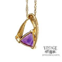 8mm Trillion cut Amethyst, approximately 1.4 carats 14k Yellow Gold accented with 3 flush set diamonds 18.5” chain with spring ring closure 2.7 grams total weight