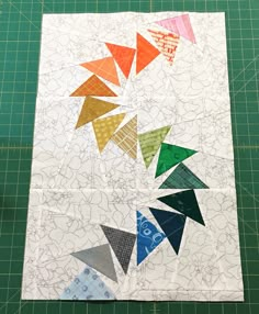 the block has many different colored triangles on it