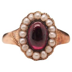 Year: 1863 (Engraved on inner shank) Item Details: Ring Size: 7 Metal Type: 9k Yellow-Rose Tone Gold [Hallmarked, and Tested] Weight: 3.0 grams Center Details: Tourmaline, Deep Purple, 7.7mm x 5.25mm, Natural Side Stone Details: Seed Pearls, 2mm each. Band Width: 2.55mm Condition: Excellent Victorian Victorian Rings Vintage, Antique Garnet Ring, Victorian Gold Ring, Etruscan Jewelry, Victorian Engagement Rings, Family Jewels, Victorian Gold, Victorian Rings, Garnet Jewelry