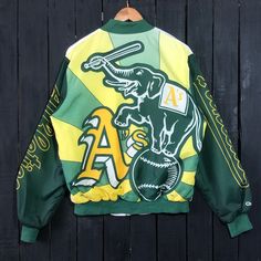 Vintage 80s Oakland Athletics Chalk Line Jacket Bomber Fanimation Varsity A's Saiz Medium Boxy Label : Chalk Line Label Size :M (refer the measurement) Made in USA Materials from (Lining 100% Polyester) (Shell 100% Polyester) ( Knit Trim 100% Polyester) Used Item With Condition 7/10 Refer Picture. Stain and No Holes. Lay Down Flat Measurement : - Width (armpit to armpit) and: 23 Inches - Length (shoulder to end of garment): 25 Inches We are selling used clothing with good condition. DO NOT EXPECT the item is like new condition. Shipping: DHL EXPRESS with TRACKING NUMBER. Track and Trace http://www.dhl.com Parcel will be arrive within 3-6 business days or more due to location and custom clearing. Please PROVIDE your PHONE/CONTACT NUMBER for SHIPPING/DELIVERY purpose. VERY IMPORTANT ‼ for sa Retro Varsity Jacket With Graphic Print For Spring, Retro Spring Varsity Jacket With Graphic Print, Retro Graphic Print Varsity Jacket For Spring, Spring Retro Varsity Jacket With Graphic Print, Retro Varsity Jacket With Graphic Print, Retro Track Jacket For Spring Streetwear, Retro Spring Track Jacket For Streetwear, Vintage Outerwear With Graphic Print For Streetwear, Retro Green Track Jacket For Streetwear