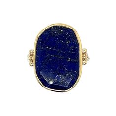 We love this cocktail Lapis ring set in 14k yellow gold. It is accented with gold beads and sits beautifully on Emily's signature Sterling Silver band. Approximate stone size is 20mm x 14mm. Approx ct weight: 10.6 ct Mohs hardness: 5-6 This mixed metal piece is handmade to order in Emily's Hudson Valley studio. Please allow for slight variations in stone color, size and shape. Please allow 14-21 days to ship unless the piece is in stock. If you have questions about sizing, shipping or custom ord 14k Gold Ring With Large Stone For Anniversary, Yellow Gold 14k Rings With Natural Stones, Gold Ring With Large Oval Cabochon Stone, 14k Gold Ring With Large Stone For Gift, 14k Gold Rings With Large Stone For Gift, 14k Gold Jewelry With Large Stone Ring, Gold Gemstones Ring With Gemstone Accents, Yellow Gold Rings With Lapis Lazuli Gemstone, Gold Sterling Silver Rings With Natural Stones