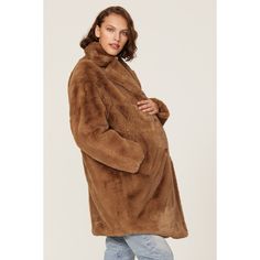 Brown faux fur (50% Recycled Fabric, 50% Polyester). Shearling. Long sleeves. Front button closure. 37" from shoulder to hemline. Imported. Faux Fur Coat With Faux Fur Lining, Fall Faux Fur Coat With Faux Fur Trim, Fall Sheepskin Fur Coat With Faux Fur Lining, Cozy Fall Fur Coat With Faux Fur Trim, Oversized Faux Fur Coat For Fall, Chic Oversized Faux Fur Coat, Mink Colored Shearling Fur Coat With Faux Fur Trim, Fall Mink Color Fur Coat With Faux Fur Trim, Oversized Fur Coat With Faux Fur Lining For Fall