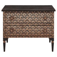 an ornate wooden chest with black and gold designs on the front, it is made from wood