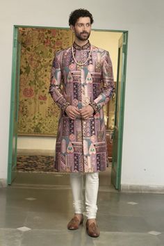 Rose wine sherwani with floral and geometric motifs in a mosaic patterned base, highlighted by placed floral embroidery. Comes with inner kurta and churidar. - Aza Fashions Designer Straight Kurta For Reception, Designer Meenakari Kurta For Diwali, Meenakari Straight Kurta For Eid, Eid Meenakari Straight Kurta, Straight Kurta With Meenakari For Eid, Traditional Kurta With Meenakari, Designer Straight Kurta Sherwani For Diwali, Designer Pink Sherwani For Festive Season, Fitted Meenakari Kurta For Festivals