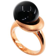 Here is a beautiful Onyx ring. It may look simple but the fact is that it is very very difficult to make because of the curve lines. The ring is set in 18k rose gold. The Onyx is 12mm in size and round. The combination of black and rose gold color is exceptional. The lines of this ring are special. One can look at this ring over and over again. It is very eye pleasing. This will be a great gift for that special someone. Please refer to the many high definition photos for more details. We can als Elegant Black Dome Ring With Polished Finish, Polished Finish Round Ring For Evening, Modern Polished Finish Rings For Evening, Modern Rose Gold Dome Ring With Polished Finish, Elegant Rose Gold Rings With Polished Finish, Elegant Domed Rings For Formal Occasions, Luxury Rose Gold Dome Ring With Polished Finish, Elegant Rose Gold Dome Ring With Polished Finish, Luxury Rose Gold Open Dome Ring