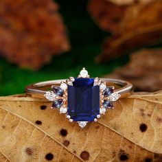 Engagement Ring Metal Type: 925 Sterling Silver, Soild 10k Gold, Solid 14k Gold, Solid 18k Gold Center Stone: Lab Created Sapphire Center Carat Weight: Emerald Cut 2CT (6x8mm) Side Stone: S Moissanite / Lab Created Alexandrite Side Carat Weight: 0.33ctw Band Width: 2mm SKU: ESAMXR0008-sapphire Accessories: *Shipped with beautiful ring box; *Directly price from Manufacturer, 1/3 the price from Jewelry Store; - Ethically Sourced Luxury Gold Radiant Cut Sapphire Ring, Luxury Lab-created Sapphire Emerald-cut Diamond Ring, Luxury Timeless Tanzanite Sapphire Ring, Emerald Cut Engagement Ring Sapphire, Blue Sapphire Gold Ring, Blue Sapphire Engagement Ring Gold, Blue Engagement Ring Sapphire, Sapphire Emerald Cut Engagement Ring, Blue Sapphire Rings Engagement