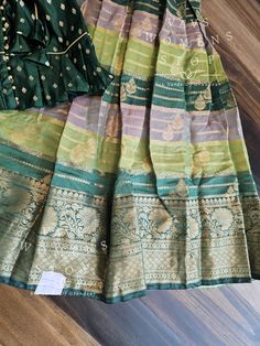 This Lehenga set suits 6 yr - 7 yr. Kindly Please Message me If needed measurements before purchase. Green Silk Cutdana Sets, Transitional Multicolor Silk Sharara, Transitional Season Silk Multicolor Sharara, Transitional Season Multicolor Silk Sharara, Fitted Green Banarasi Silk Dress, Green Banarasi Silk Fitted Salwar Kameez, Traditional Palazzo Set With Zari Weaving, Fitted Art Silk Sets With Traditional Patterns, Green Palazzo Set With Unstitched Blouse For Festivals