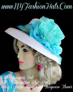 Ladies Women's White Formal Kentucky Derby Designer Spring Or Summer Hat, With A Large Turquoise Blue Organza Bow, A Large Aqua Blue Flower, And Turquoise Blue And Aqua Blue Millinery Leaves. This Beautiful Hat, Is Suited For A Bride To Be On Her Wedding Day. We Sell Church Hats, Designer Hats For Women, Kentucky Derby Hats, Dress Hats For Women, Ladies Formal Hats, Belmont Stakes Hats, Preakness Hats, Saratoga Horse Racing Hats, Hats For Weddings, Tea Party Hats, Holiday Hats, Easter Hats, And Hats For Weddings, Bride Hats, Special Occasion Hats, Mother Of The Bride Hats, Ladies Dress Hats, Dressy Hats, Classy Hats, Organza Bow, Royal Ascot Hats