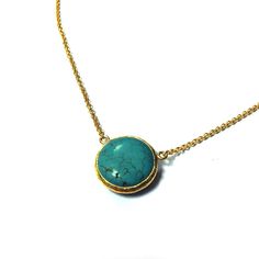 Coin Turquoise Necklace in Silver or Gold This Necklace is hand crafted with pure and sterling silver. The gold color is done by coating silver with 18 karat gold. The length of the necklace is Approximately 15.7 inches (40cm) witha- an adjustable end and a pearl that dangles at the back. I ship my items well-cushioned, inside a bubble mailer in organze gift pouches or gift boxes, prettily packaged and perfect for giving. I also include a zipped bag for you so that you can safely store your jewe Turquoise Necklace With Round Natural Stone Pendant, Elegant Turquoise Necklace With Round Pendant In Yellow Gold, Elegant Yellow Gold Turquoise Necklace With Round Pendant, Handmade Dainty Gold Turquoise Necklace, Gold Turquoise Gemstone Necklace In Dainty Style, Dainty Handmade Gold Turquoise Necklace, Dainty Gold Turquoise Gemstone Necklace, Handmade Turquoise Necklace With Round Gold Pendant, Handmade Gold Turquoise Necklace With Round Pendant