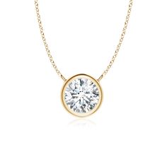 This bezel-set pendant necklace, crafted in 14k yellow gold, is a perfect mix of extravagance and simplicity. The solitaire diamond pendant is attached to the chain by the loops. Cut in a classic round shape, the diamond shines with unmatched brilliance. Choose from different stone qualities (K, I3, I-J, I1-I2, H, SI2, GH VS) and multiple total carat weight options. Solitaire Diamond Pendant, Solitaire Necklace, Solitaire Pendant Necklace, Diamond Solitaire Necklace, Solitaire Necklaces, Solitaire Diamond, Solitaire Pendant, Diamond Pendant Necklace, Fine Jewellery Necklace