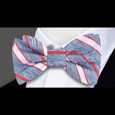 Classic Elegance: Light Blue, Red, and White Stripe Silk Bow Tie Step into timeless sophistication with our light blue, red, and white stripe silk bow tie – a versatile accessory that effortlessly combines classic design with a touch of modern flair. This bow tie isn't just an addition to your wardrobe; it's a statement piece that allows you to showcase your refined taste with ease. Join us as we delve into the details of this classic bow tie and explore the countless ways it can elevate your st Classic Summer Bow Tie With Decorative Bow, Elegant Red Ties For Spring, Elegant Red Spring Tie, Elegant Red Spring Ties, Classic Red Ties With Bow Tie Back, Classic Red Bow With Ties, Red Tie For Spring Formal Occasions, Red Ties For Spring Formal Occasions, Formal Summer Bow Tie With Ribbon