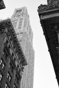 black and white photograph of tall buildings in new york city