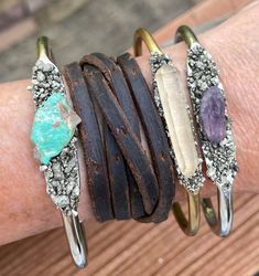 Our raw stone cuffs are easy and comfortable to wear. They're also great layering pieces. These three are up for grabs! You'll receive a similar cuff. - Pyrite + Amethyst  - Pyrite + Raw Turquoise  - Thick Silver plated rhodium  - Pyrite + Quartz - Brass Crystal Cuff Bracelet, Raw Turquoise, Raw Stone, Layering Pieces, Jewelry Ideas, Cuff Bracelets, Silver Plate, Silver Plated, Layering