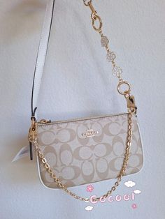 100% AUTHENTIC and BRAND NEW ! Condition is new with tags.  coach style # c3308 MSRP $188 +tax  coach care card inside  Plus a free gift: 2 extension chains One is camellia chain , other is gold chain  The camellia extension chain is perfect to become a shoulder bag or crossbody. ALL ITEMS ARE GUARANTEED 100% AUTHENTIC AND BRAND NEW!  Shipped with USPS priority /USPS Ground Advantage / UPS ground. Ship out in 2 business days or whenever possible same day! Please note that the color in pictures might differ slightly due to lighting, flash and screen resolution. In a smoke and pet free house! Please contact me if you have any questions. Thank you for supporting my small business!  Please view and check my other ebay store items! Product Details Signature coated canvas and smooth leather Colo Coach Nolita 19, Coach Nolita, Nolita 19, Swag Bags, Gold Sand, Swag Bag, House Inside, Luxury Purses, Girly Accessories