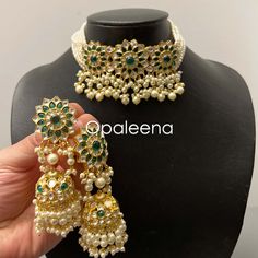 Stylish and exquisite ethnic - Asian - Indian - Punjabi - Pakistani green wedding choker Indian gold jewellery set bridal jewelry elegant polki choker emerald stone jewelry party set trendy gold choker. Perfect gift for Mother's day. Length of the choker: 24 cms  Width of the choker: 5.8 cms String length: 40 cms Length of the earrings: 8.9 cms  Width of the earrings: 3 cms  Weight: 112 grams GIFT / PERSONALISED MESSAGE: Please provide the message within the NOTE TO SELLER section if you want to Indian Gold Jewellery Set, Bohemian Jewelry Earrings, Dark Blue Earrings, Polki Choker, Gemstone Earrings Dangle, Wedding Necklace Set, Choker Gold, Bridal Choker, Jewelry Elegant