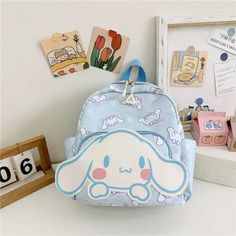 Introducing the Cartoon Printed Backpack, a practical accessory designed for those who enjoy playful and whimsical designs. This backpack features an array of charming cartoon characters, making it perfect for school, travel, and everyday use. Features: Material: Made from durable polyester fabric, ensuring long-lasting use and easy maintenance. Dimensions: Measures approximately 33 cm in height, 28 cm in width, and 11 cm in depth, providing space for all your essentials. Design: Showcases a vib Hello Kitty School Bag, Hello Kitty School, Cartoon Backpack, Handstamped Bracelet, Stamped Bracelet, Travel Workout, Print Book, Art Kits, Toy Organization