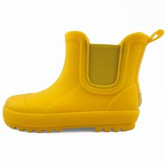 Get ready to embark on rainy adventures with your little one in style and comfort. Our BEARPAW Chelsea Toddler Rain Boots with Faux-Fur Lining are specially designed to keep tiny feet dry and happy, no matter the weather. Crafted from durable waterproof PVC, these rain boots are built to withstand puddle-jumping escapades. The built-in elastic band makes putting them on and taking them off a breeze. The all-weather traction sole ensures secure footing in any conditions, providing peace of mind f Insulated Round Toe Rain Boots, Non-slip Rain Boots For Winter, Non-slip Rain Boots For Outdoor Activities, Non-slip Round Toe Rain Boots For Outdoor Activities, Yellow Insulated Boots For Outdoor, Playful Non-slip Rain Boots For Rainy Weather, Playful Waterproof Boots For Outdoor, Yellow Weatherproof Rain Boots For Outdoor, Playful Waterproof Round Toe Rain Boots