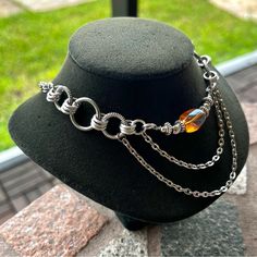 Handmade . Maille Links Stainless Steel Choker Necklace With Oval Iridescent Orange Pink Aura Crystal Charm & Dangly Chains . Choker Necklace Is Adjustable 14 To 17 Inch Long ( If You Need A Different Size Let Me Know ) Chains Are Nickel Free , Allergy Free , Hypoallergenic , No Itching . Tags : Gem / Gems / Gemstones / Crystals / Boho / #Bohemian / Bohochic / Goth / #Gothic / Punk / Emo / Victorian / Queen / Viking / Celt / #Celtic / Moon Child / Moon Phase / Witch / Fairy / Mermaid / Ocean / B Unique Metal Choker With Adjustable Chain, Adjustable Stainless Steel Choker Chain Necklace, Adjustable Stainless Steel Chain Choker Necklace, Adjustable Stainless Steel Chain Choker, Adjustable Wire Wrapped Metal Necklaces, Trendy Metal Jewelry Wire Wrapped, Adjustable Metal Chain Choker, Unique Adjustable Metal Choker, Handmade Metal Dangle Choker