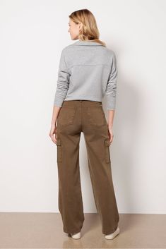 The Miller Wide Leg Pant by Kut from the Kloth will be a wardrobe staple this season. Crafted in a comfortable lyocell blend, these pants feature a full-length inseam, high-rise waist, cargo side pockets, and a relaxed silhouette. | KUT FROM THE KLOTH Women's Miller Wide Leg Pants, Size 4, Green Relaxed Fit Wide Leg Cargo Jeans For Autumn, Relaxed Fit Wide Leg Cargo Jeans For Fall, Fall Relaxed Fit Wide Leg Cargo Jeans, Fall Utility Wide Leg Pants With Relaxed Fit, Khaki Wide Leg Pants With Elastic Waistband For Fall, Fall Wide Leg Khaki Pants With Elastic Waistband, Wide Leg Utility Bottoms For Fall, Fall Cargo-style Wide-leg Jeans, Fall Wide Leg Cargo Pants