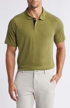 Sweat-wicking fabric brings all-activity comfort to a golf polo made of a soft piqué knit and styled to go easily from the course to the clubhouse. 27 1/2" front length; 28" back length (size Medium) Button half-placket Spread collar Short sleeves Moisture-wicking fabric engineered for dryness and comfort Reflective logo enhances visibility in low light or at night 66% rayon, 34% polyester Machine wash, tumble dry Imported Sporty Relaxed Fit Polo Shirt For Golf, Collared Polo Shirt For Golf In Athleisure Style, Athleisure Collared Polo Shirt For Golf, Classic Golf Polo Shirt With Seamless Collar, Classic Polo Shirt With Seamless Collar For Golf, Classic Relaxed Fit Polo Shirt For Golf, Casual Go-dry Polo Shirt For Golf, Functional Collared Polo Shirt For Golf, Classic Solid Color Golf Tops