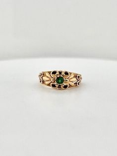 A beautiful handcrafted 14k yellow gold ring by our in house goldsmith, Charlie Thyme,  features a genuine round Tsavorite garnet gemstone and delicate filigree details.  Currently this ring is a size 6 1/2 but can be sized at no additional cost! Tsavorite Garnet, Feb 7, Filigree Ring, Garnet Gemstone, Yellow Gold Ring, Stackable Rings, Thyme, Yellow Gold Rings, Gold Ring