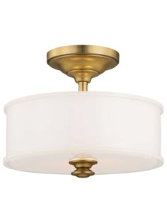 a light fixture with a white shade on the bottom and a gold finish to it