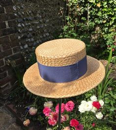 Vintage Ridgmont Make School Boater Straw Hat with Blue Trim - 53cm The hat can be perched on a larger head size (I can perch it comfortably on my 56.5cm head) This is a traditional stiff boater hat.  High quality Ridgmont hat brand. The straw is in remarkably good condition considering its age and use. Natural imperfections in the straw with small breaks on the edge of the brim consistent with age and use.  Owner's name on headband.  Stains and light fraying on the green ribbon, with stains to the headband and lining consistent with age and use.  Natural imperfections in the straw with small breaks consistent with age and use.  Please check your head measurement before you buy! If you need advice on how best to measure your head, please get in touch. Shipping:  I combine postage. I post U Summer Flat Cap For Outdoor, Summer Outdoor Flat Cap, Adjustable Flat Cap Hats For Summer, Adjustable Flat Brim Boater Hat For Garden Party, Kentucky Derby Short Brim Top Hat, Adjustable Flat Brim Hat For Garden Party, Adjustable Brimmed Top Hat For Garden Party, Adjustable Wide Brim Top Hat For Garden Party, Spring Adjustable Fit Flat Brim Hat