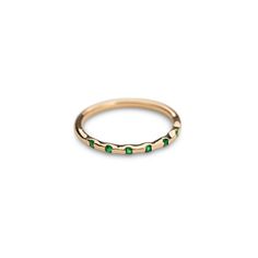 Fall in love with our 14k Solid Gold and Emerald Stackable Ring. Classy and timeless. The perfect gift for a special someone or simply as a reminder to love yourself! Featuring 7 Genuine ethically sourced Emeralds Material: 14k Gold and Genuine Emeralds Please note, our current processing time for this ring is 1 - 2 weeks. Oval 14k Gold Eternity Band, Green Half Eternity Ring In 14k Gold, 14k Gold Green Half Eternity Ring, Green 14k Gold Half Eternity Rings, Fine Jewelry Stackable Emerald Ring With Round Band, Fine Jewelry Stackable Emerald Ring, 14k Gold Green Half Eternity Jewelry, 14k Gold Open Emerald Ring, Fine Jewelry, 14k Gold Emerald Open Ring