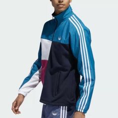 Genuine Adidas Originals Asymm Full Zip Track Jacket Colour: Active Teal / Berry Brand New With Tags 100% Authentic - Free Delivery Panelled In A Palette Of Blue, Pink And White, This Adidas Track Top Is A Pure Cotton Piece That Proves That Opposites Really Do Attract. Made Up Of Contrasting Patterns And Fabrics To Create A Striking Look, The Zipped Piece Is Completed With A Pair Of Practical Front Pockets. 100% Cotton Recycled Polyester Panels Stand Collar Zip Closure Adidas Track Top, Hip Hop Jacket, Adidas Jacket Women, Shirt Jacket Men, Adidas Windbreaker, Color Block Jacket, Adidas Track Jacket, Mens Windbreaker, Quarter Zip Jacket