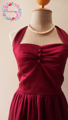 Flirty Halter Neck Wedding Dress, Red Mini Dress With Ruched Fitted Bodice, Chic Red Dress With Lined Bodice, Elegant Red Sleeveless Bridesmaid Dress, Burgundy Sleeveless Wedding Dress, Sleeveless Burgundy Wedding Dress, Red Sleeveless Mini Dress For Wedding, Vintage Bridesmaid Dress With Sweetheart Neckline, Red Dress With Pleated Bodice