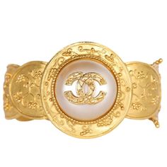 Authentic, pre-loved Chanel 96a 24k gold plated baroque hinged CC logo cuff bangle bracelet. Ultra rare investment piece. Marked on the back of the bangle. Made in France Pearl Cuff, Cuff Bangle Bracelet, Hinged Bangle, Cc Logo, Cuff Bangles, Vintage Chanel, Quality Fashion, Bangle Bracelet, Fashion Games